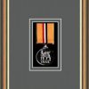 Walnut picture frame for one military medal with grey mount