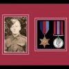 Black picture frame for two military medals/photo with beaujolais mount