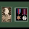 Black picture frame for two military medals/photo with forest green mount