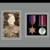 Black picture frame for two military medals/photo with grey mount