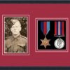 Black picture frame for two military medals/photo with beaujolais mount