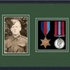 Black picture frame for two military medals/phoyo with forest green mount