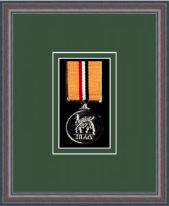 Oak picture frame for one military medal with grey mount