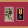 Light woodgrain picture frame for one military medal/photo with beaujolais mount