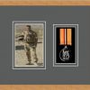 Light woodgrain picture frame for one military medal/photo with grey mount