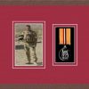 Dark woodgrain picture frame for one military medal/photo with beaujolais mount
