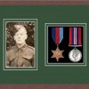 Dark woodgrain picture frame for two military medals/photo with forest green mount