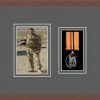 Dark woodgrain picture frame for one military medal/photo with grey mount
