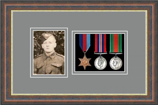 Mahogany picture frame for three military medals /photo with grey mount