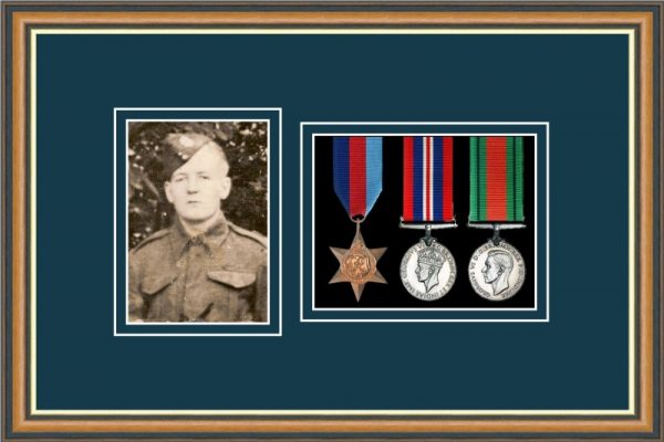Walnut picture frame for three military medals /photo with nightshade mount