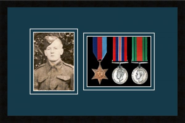 Black picture frame for three military medals/photo with nightshade mount