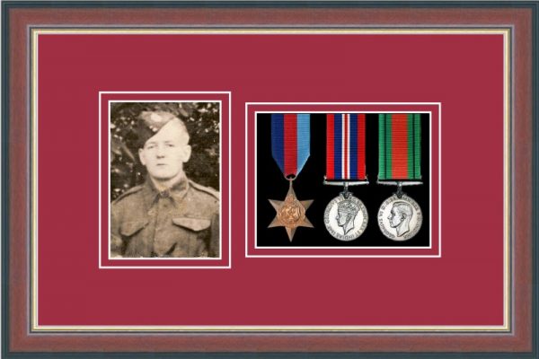 Dark walnut picture frame for three military medals /photo with beaujolais mount