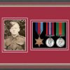 Dark walnut picture frame for three military medals /photo with beaujolais mount