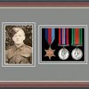 Dark walnut picture frame for three military medals /photo with grey mount