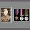 Oak picture frame for three military medals/photo with grey mount