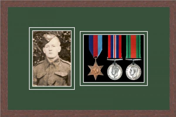 Dark woodgrain picture frame for three military medals/photo with forest green mount
