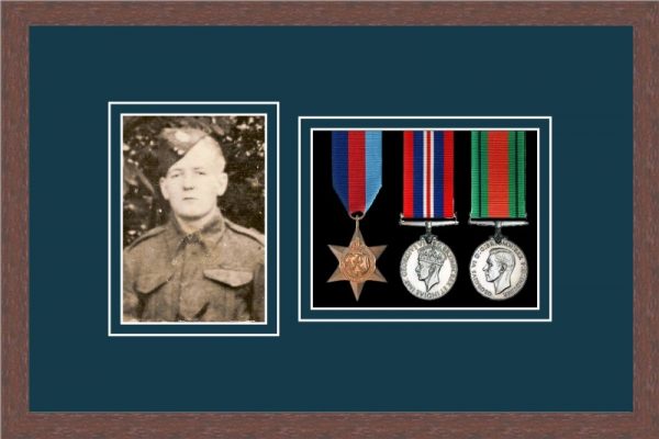Dark woodgrain picture frame for three military medals/photo with nightshade mount
