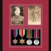 Black picture frame for four military medals/two photos with beaujolais mount