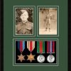 Black picture frame for four military medals/two photos with forest green mount