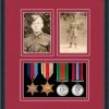 Black picture frame for four military medals/two photos with beaujolais mount