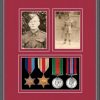 Oak picture frame for four military medals/two photos with beaujolais mount