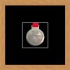 Light woodgrain picture frame for one marathon medal with black mount