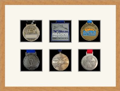 Light woodgrain picture frame for six marathon medals with antique white mount