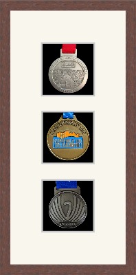 Dark woodgrain picture frame for three marathon medals with antique white mount
