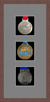 Dark woodgrain picture frame for three marathon medals with grey mount